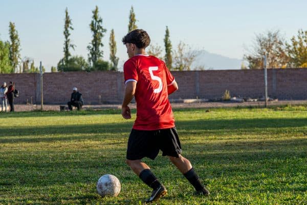 Athlete playing spring sport Spring Sports Injuries Are Back: What Athletes Need to Watch For